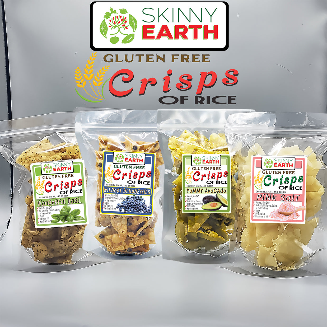 Four packages of Skinny Earth gluten-free rice crisps with visible labels on a gray background.